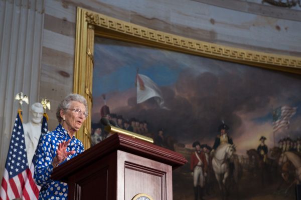 Ms. Nina Lagergren addresses congressional leaders and guests gathered in the Rotunda of the U.S. Capitol to honor the life and legacy of her half brother, Raoul Wallenberg.