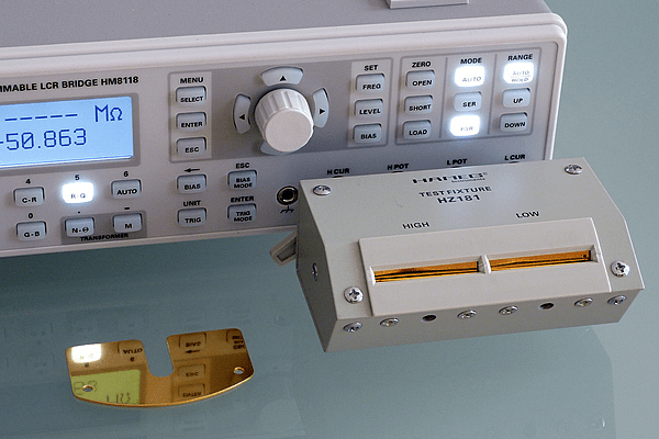 Benchtop LCR meter with attached fixture