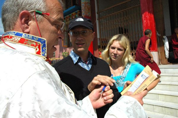 Archivist and communicator Steve Dalos collecting email addresses from Dharma students for future reference, Tharlam Monastery Courtyard, Boudha, Kathmandu, Nepal