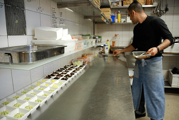 WTF Tom Wilson Man cleaning kitchen benchtop
